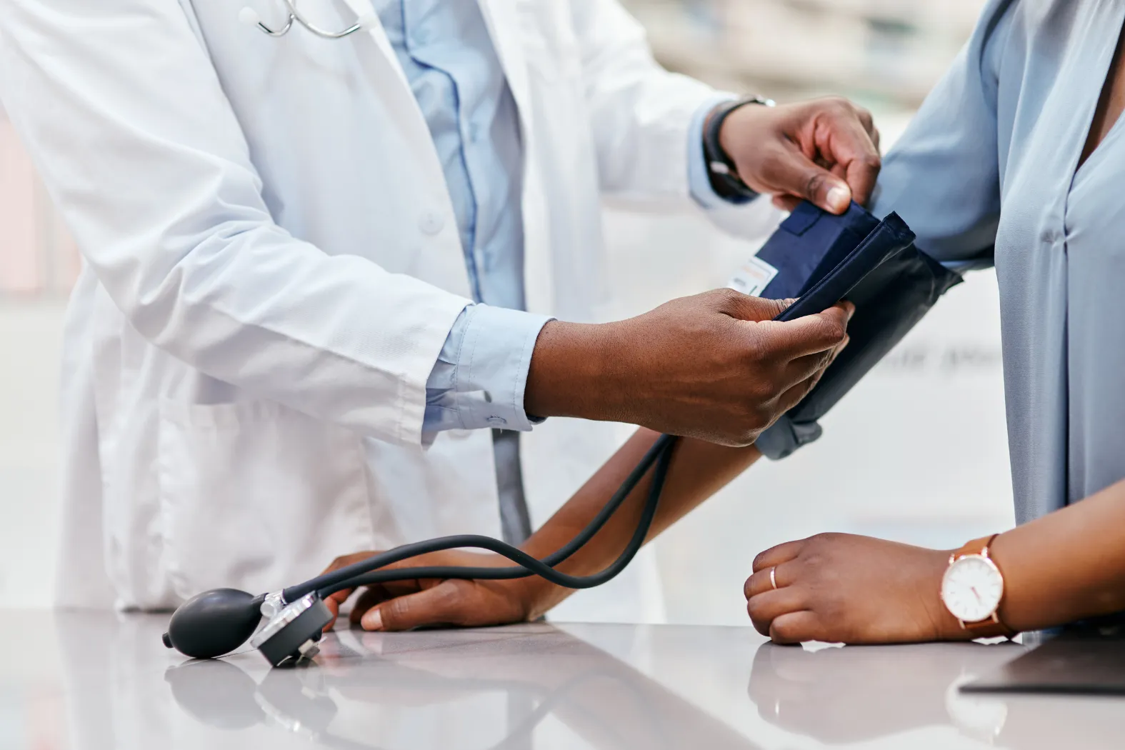 Doctor examing patients arm