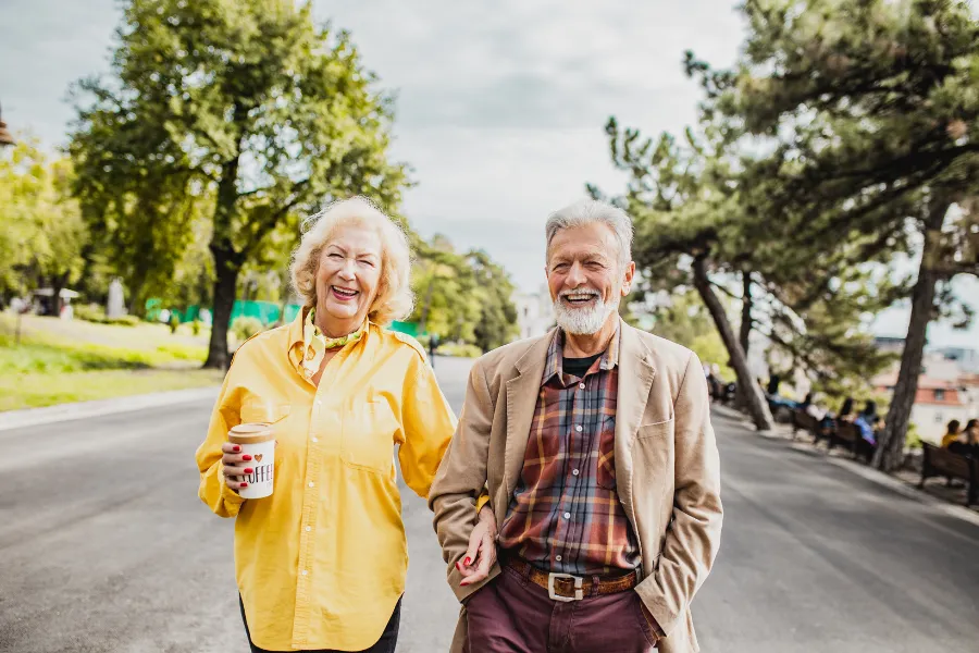Older couple walking outdoors
