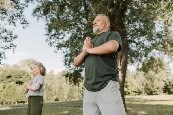 Man outdoors in relaxing position